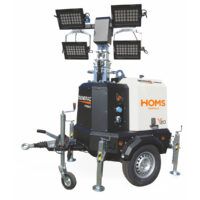 Torre de iluminación móvil con cuatro focos LED orientables para trabajos en obra.